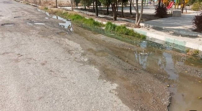 آب گرفتگی خیابان و آسفالت آسیب دیده